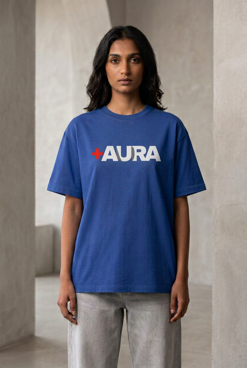 Female front wearing royal blue Aura graphic tee, corrected sharp image